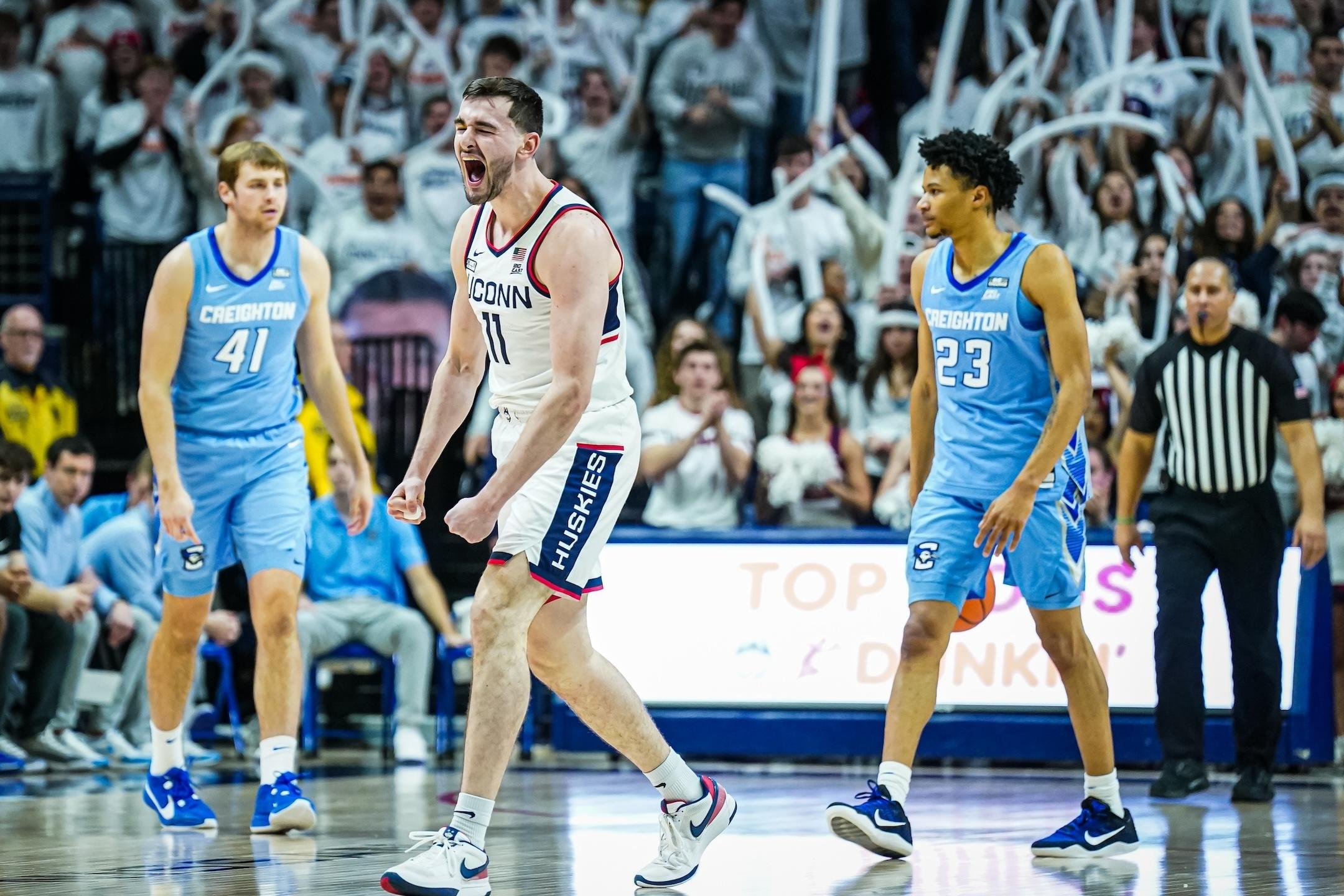 Alex Karaban reacts after a play against the Creighton